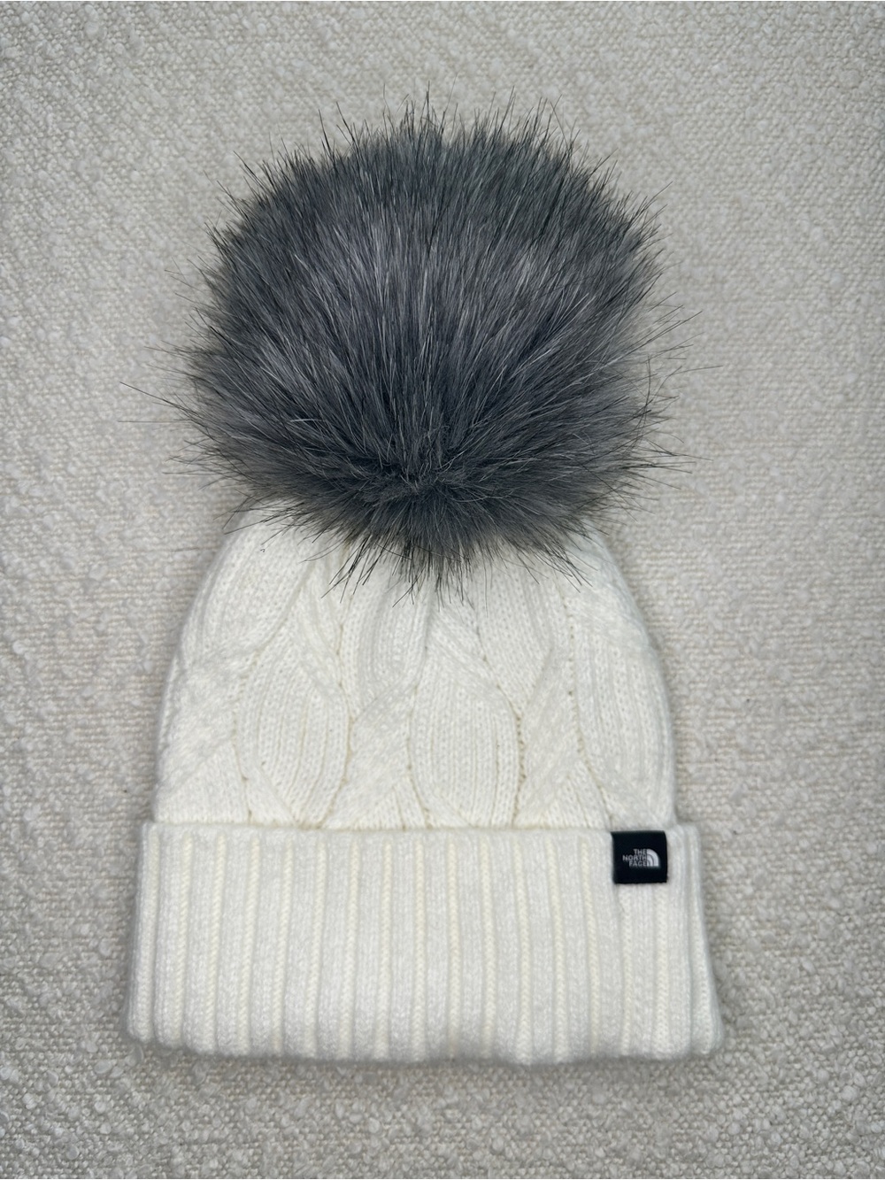 The North Face Women’s Cable Knit Pom Beanie White Gray Faux Fur Pom One Size